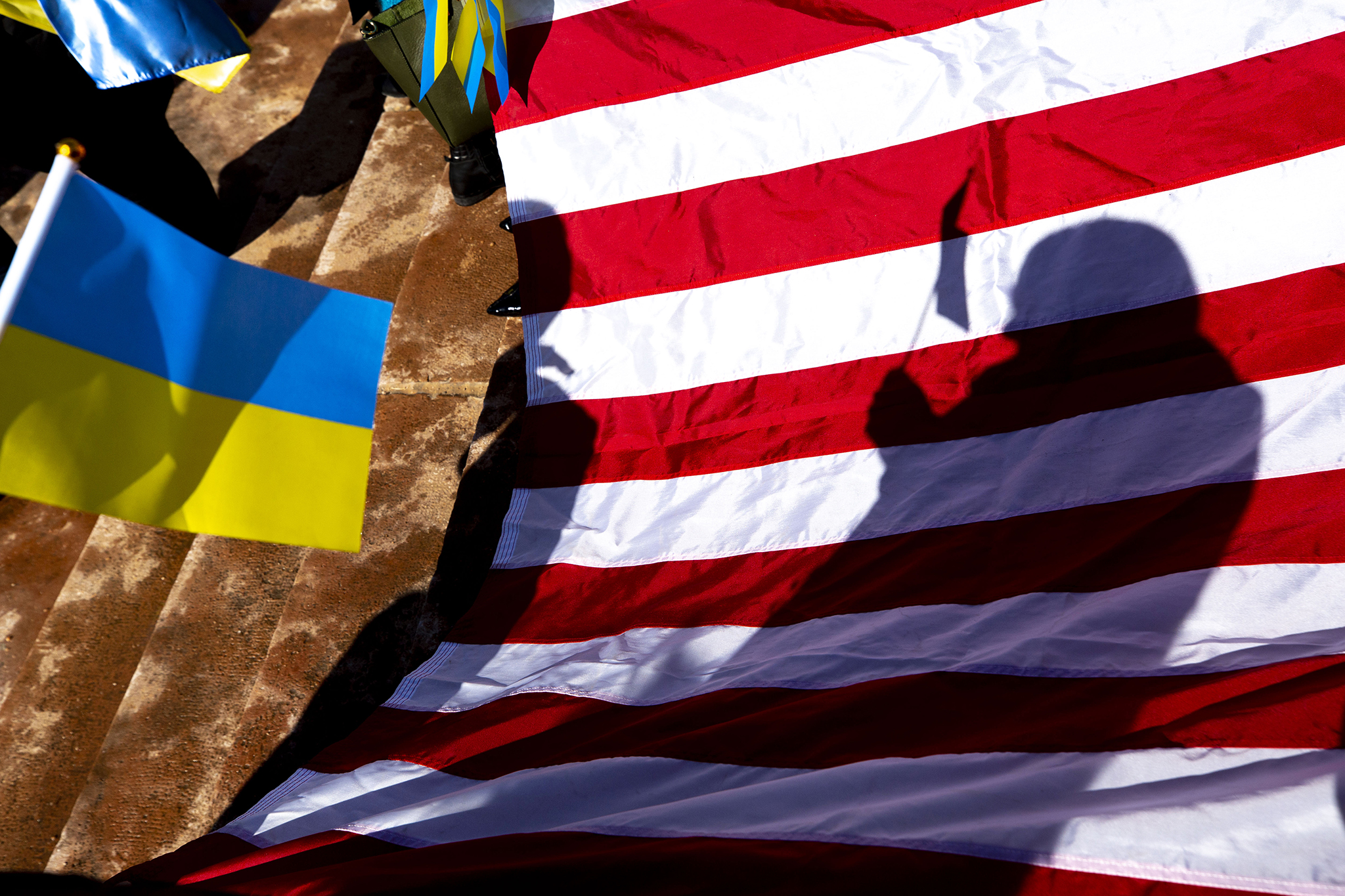 American and Ukrainian flags at a rally against Russian aggression on the Colorado Capitol steps. Feb. 24, 2022.