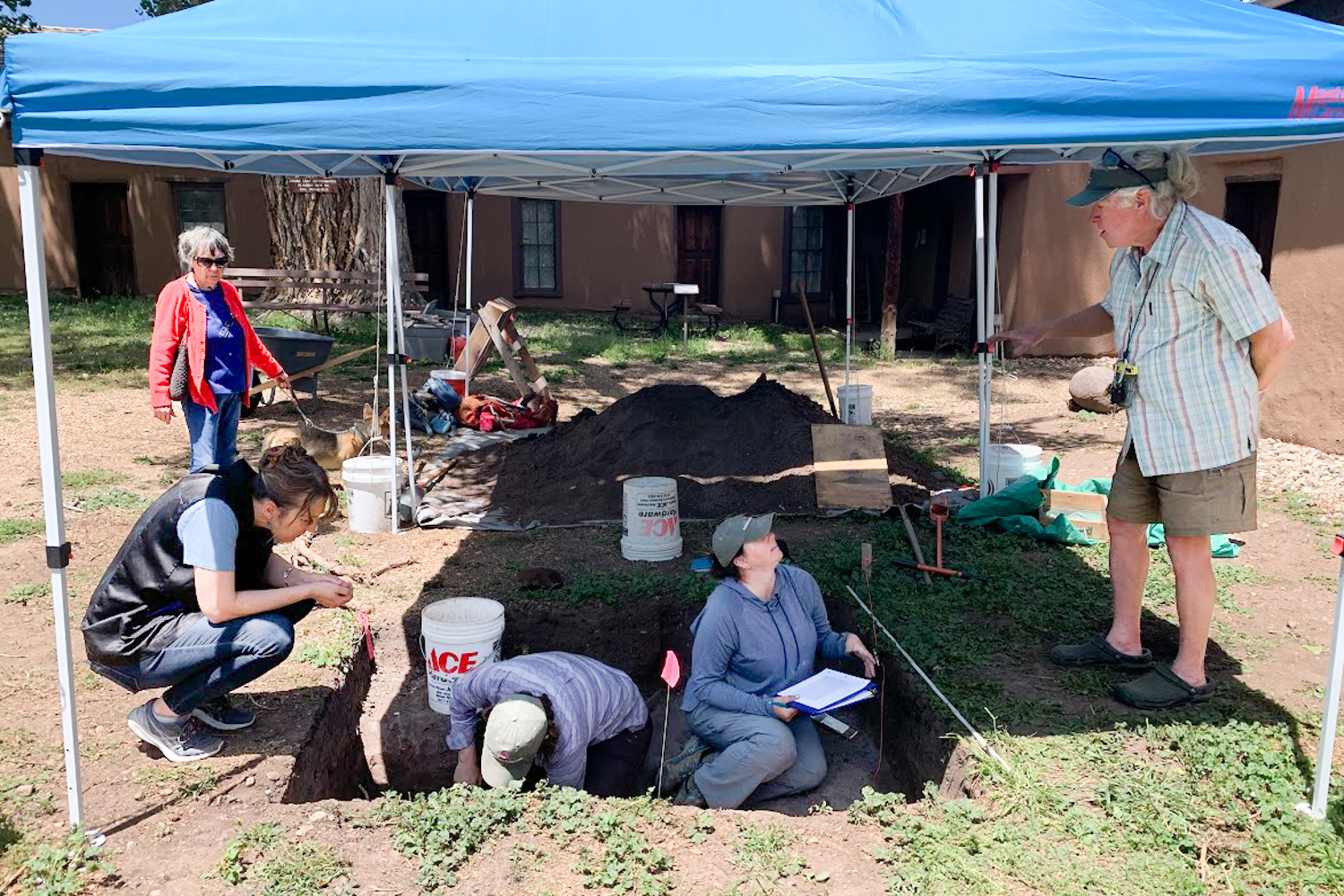 Archeologists talk with residents and visitors as they work at the Francisco Fort Museum site in La Veta. (June, 2023)