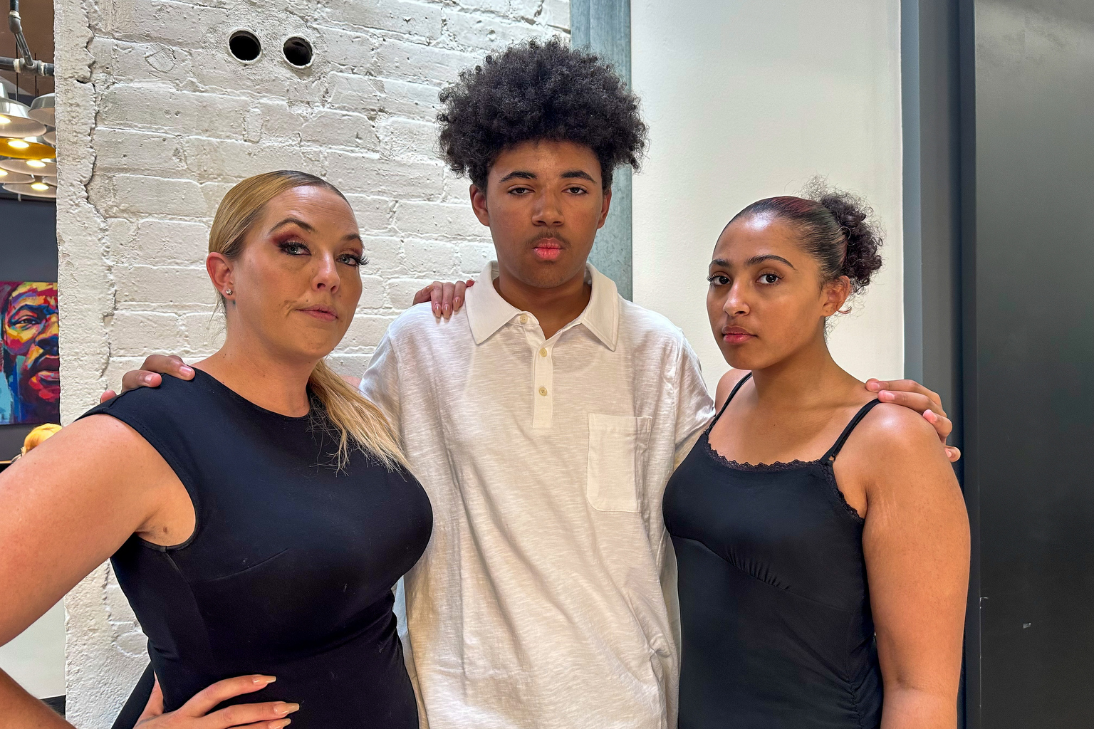 Lacey Ganzy stands with her children, Jeramiah and Nevaeh. The family filed a lawsuit against the Douglas County School District for failing to protect students from racism and bullying. 