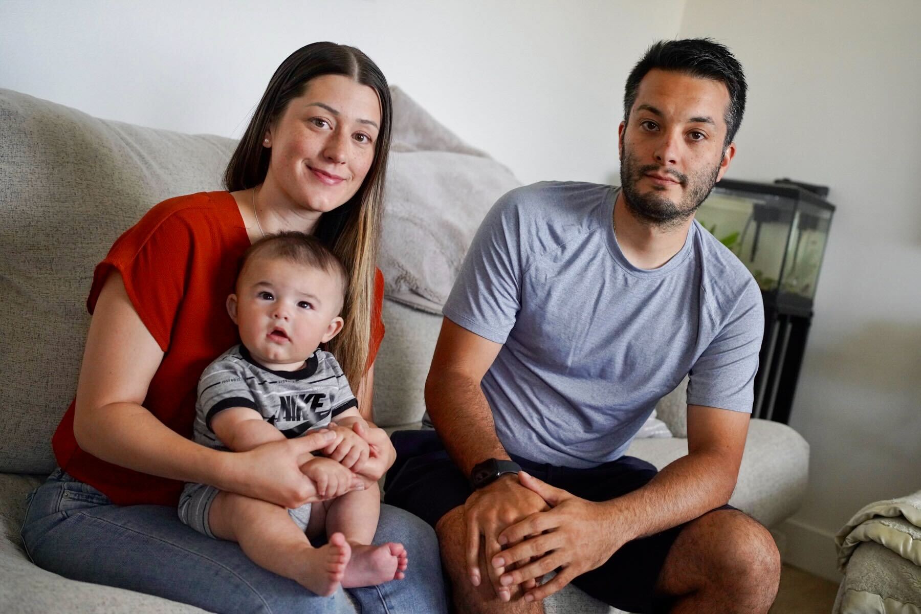 Alexis Daugherty, Jeremy Jerez and their 6-month-old son at home in Littleton on Thursday, Aug. 10, 2023.