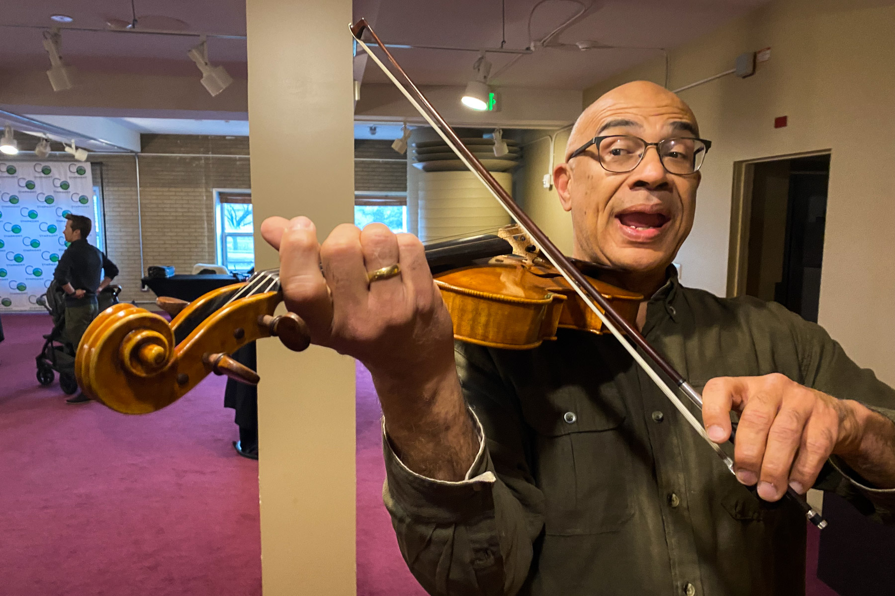 Basil Vendryes, principal viola with the Colorado Symphony, seen here attempting to play the way he normally would not. His left hand is his dominant hand.