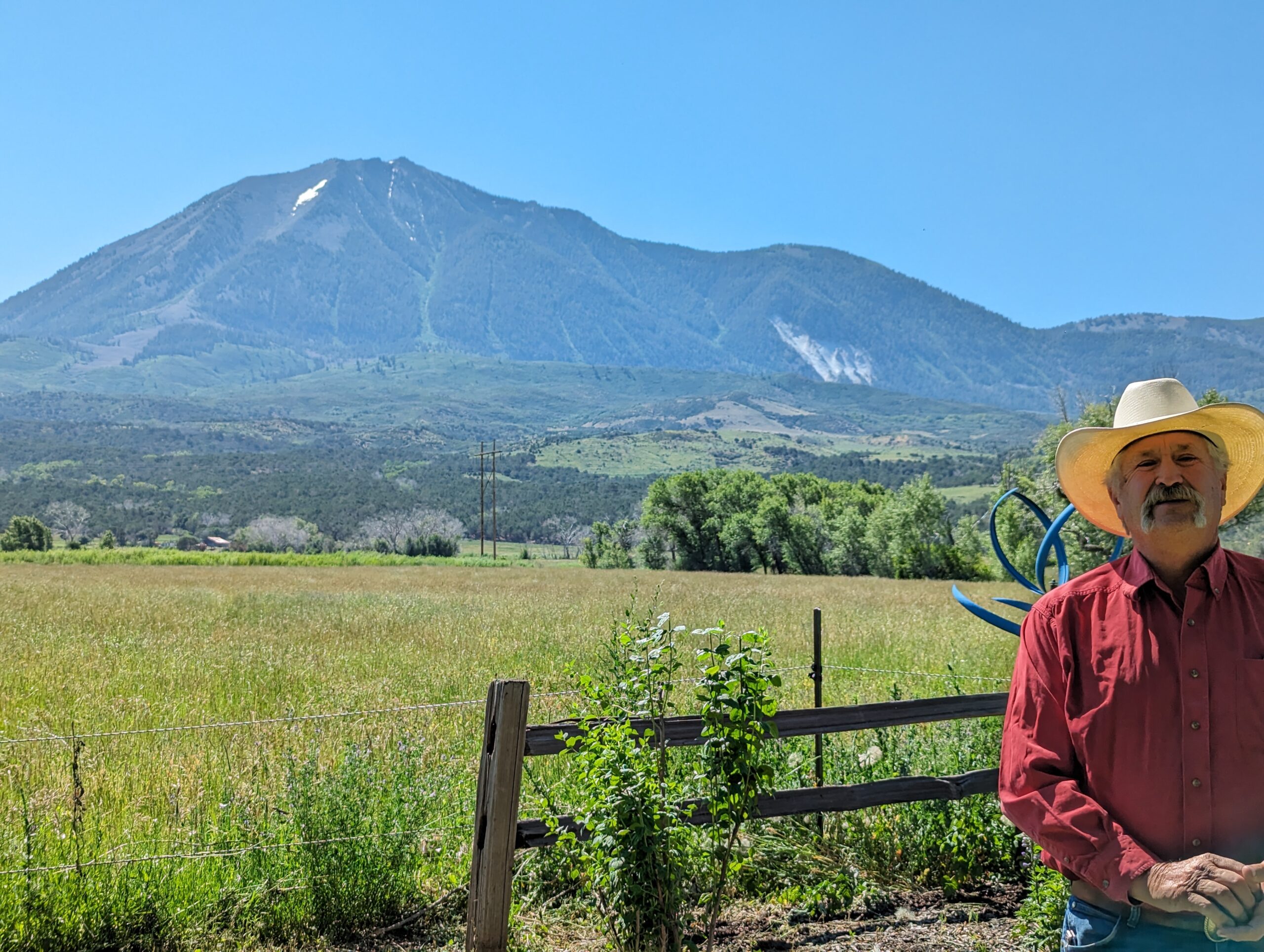 Mark Roeber, a Paonia rancher and president of the Public Lands Council, in front of Mt. Lamborn in Delta County. 