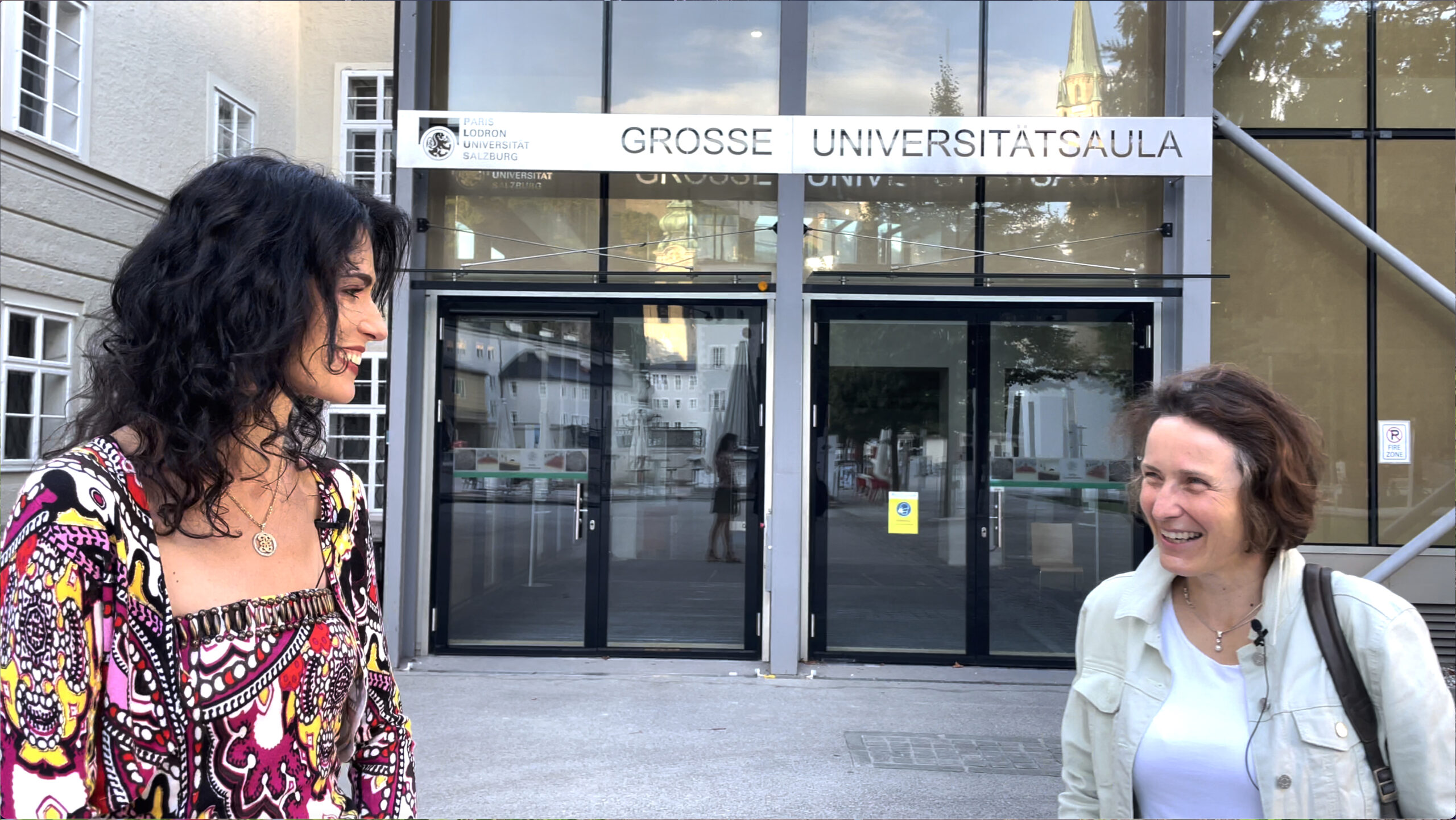 Pianist Katie Mahan with historian Dr. Eva Neumayr outside the University of Salzburg.